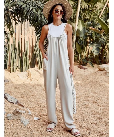 Women's Casual Jumpsuits Loose Sleeveless Overalls Adjustable Strap Long Harem Pants Romper with Pockets Apricot $10.50 Jumps...